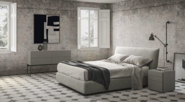 Cama Toffee modelo doble de Caccaro, con somier box y canapé. En habitación amplia y diáfana.