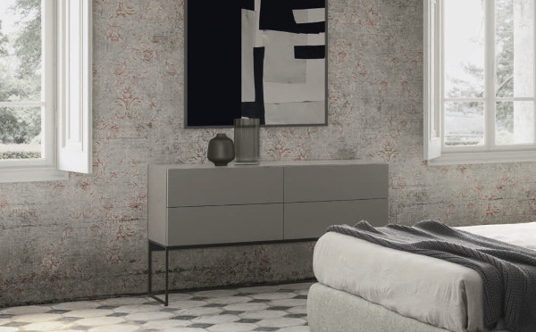 Mobiliario de habitación minimalista cajonera gris lacado mate con armazón