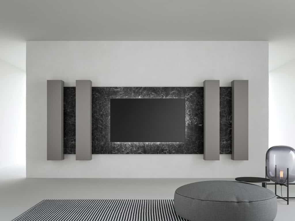 Composición minimalista para salón formada por Boiserie para TV con 2 pilares a cada lado. Todos los elementos suspendidos, fijados a la pared.